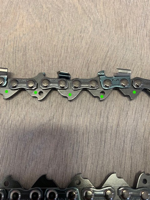 Teräketjun vetolenkki.